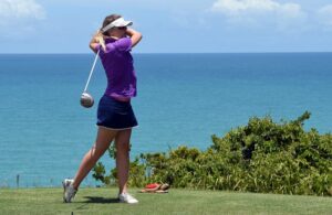 A golfer hitting a drive